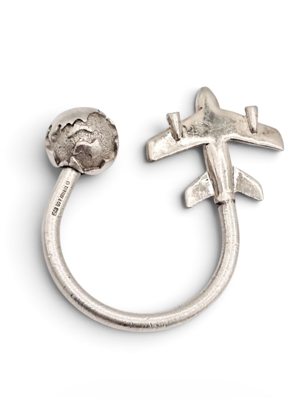 Tiffany & Co. sterling silver airplane and globe open bypass ring keychain